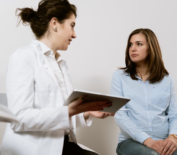 New mother at postpartum appointment